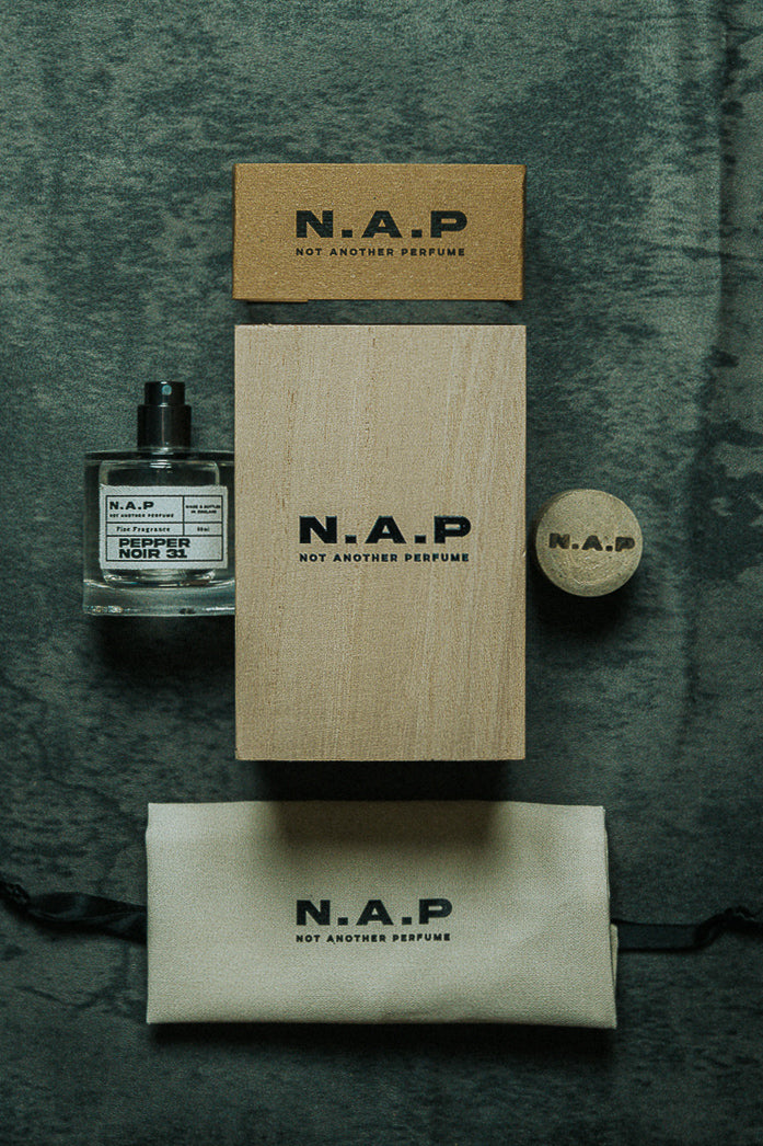 The wooden box, linen bag and cap